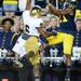 Michigan wide receiver Jeremy Gallon reaches for and misses a touchdown around Notre Dame cornerback KeiVarae Russell during the first half at Michigan Stadium on Saturday, September 7, 2013. Melanie Maxwell | AnnArbor.com